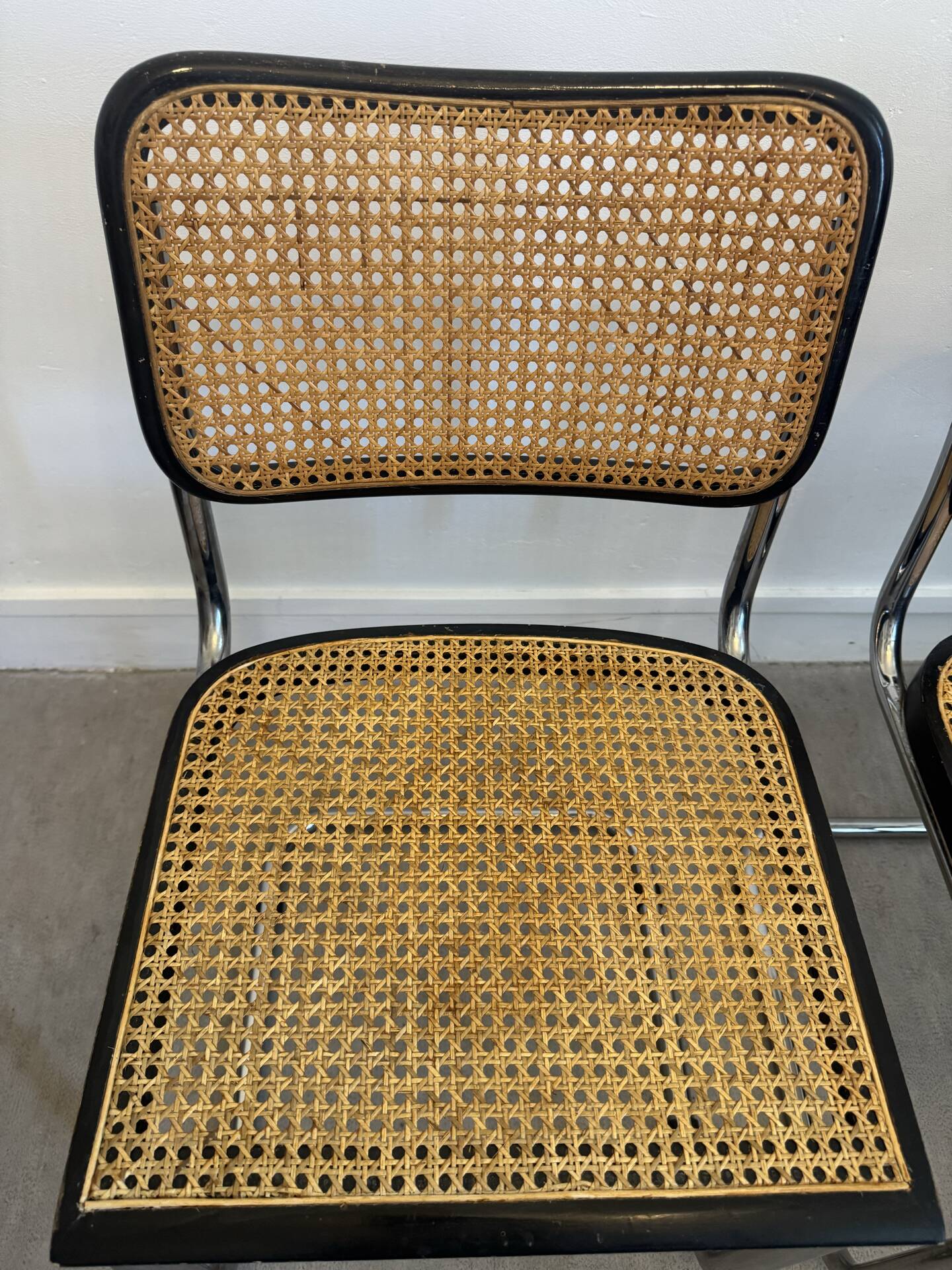 Pair of black Cesca chairs by Marcel Breuer