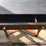 Antique black wooden console, central drawer and turned legs, 19th-century style.