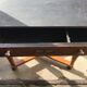 Console ancienne en bois noir, tiroir central et pieds tournés, style XIXe