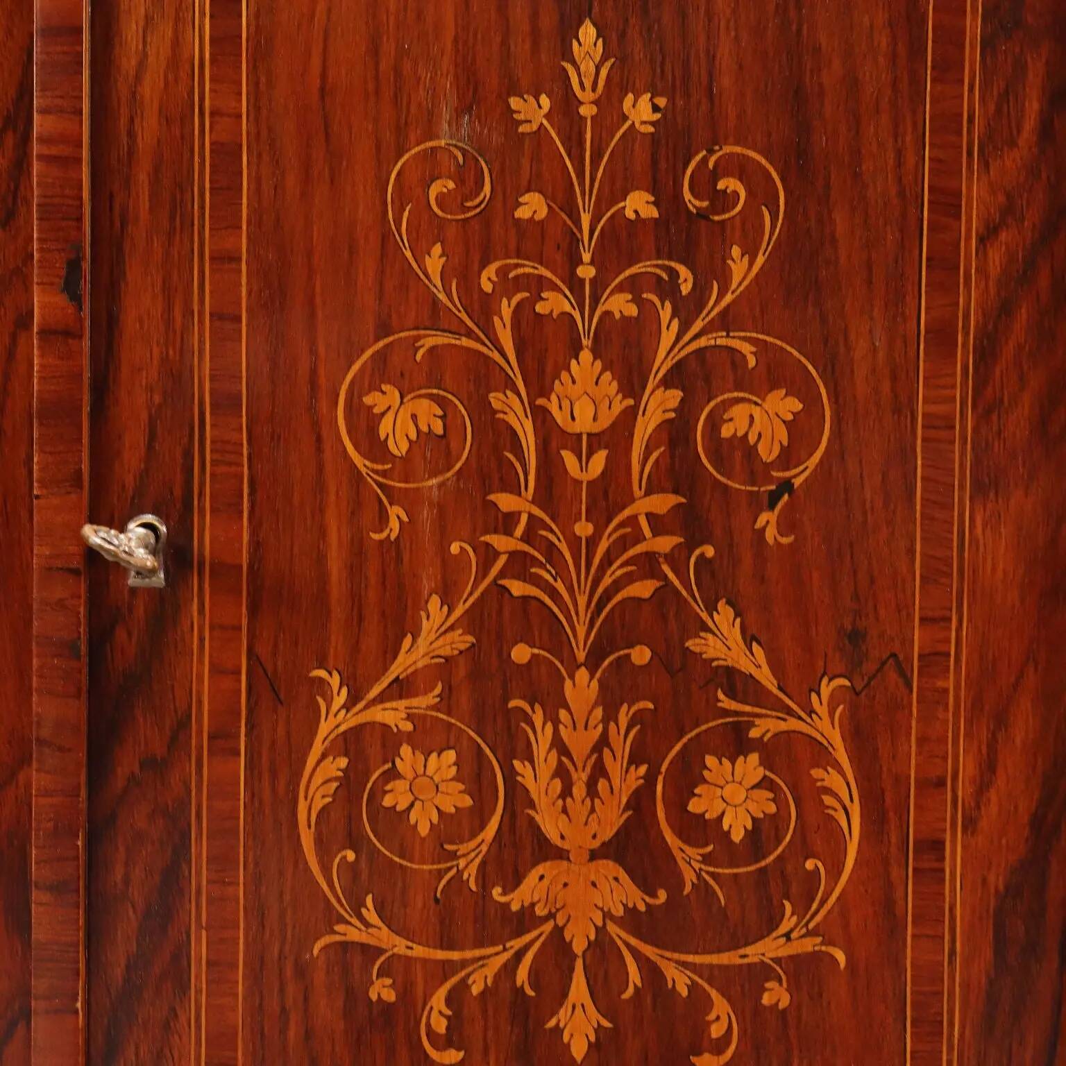 Antique neoclassical buffet veneered in various woods from the 1900s.