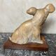 Terracotta dog signed R. Pollin