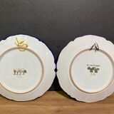 Pair of Nevers earthenware plates signed Georges