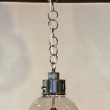Designer chandelier in chrome metal globe in smoked glass