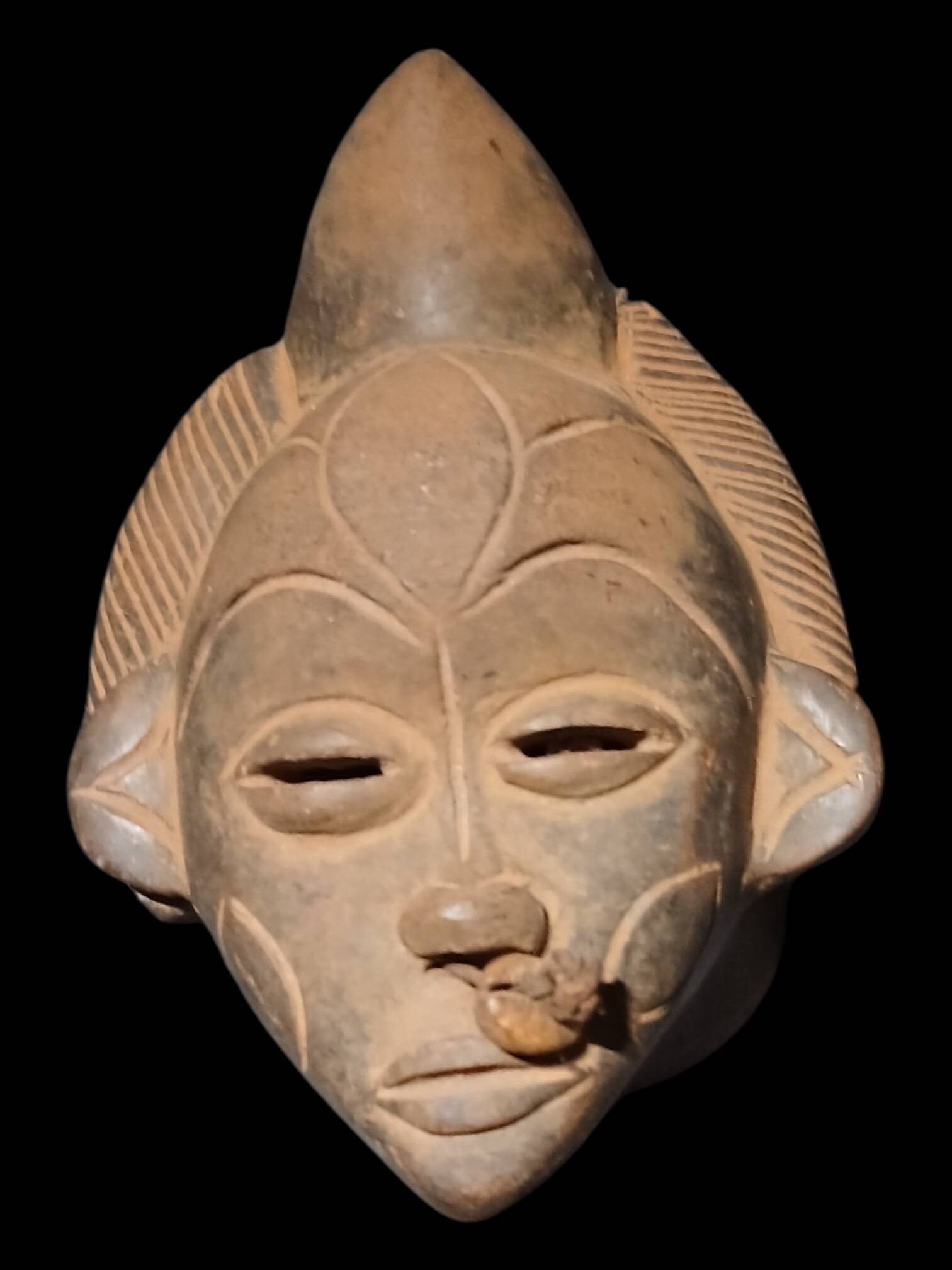 Terracotta mask from the Punu people of Gabon.
