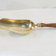 Old brass grocery grain shovel wooden handle