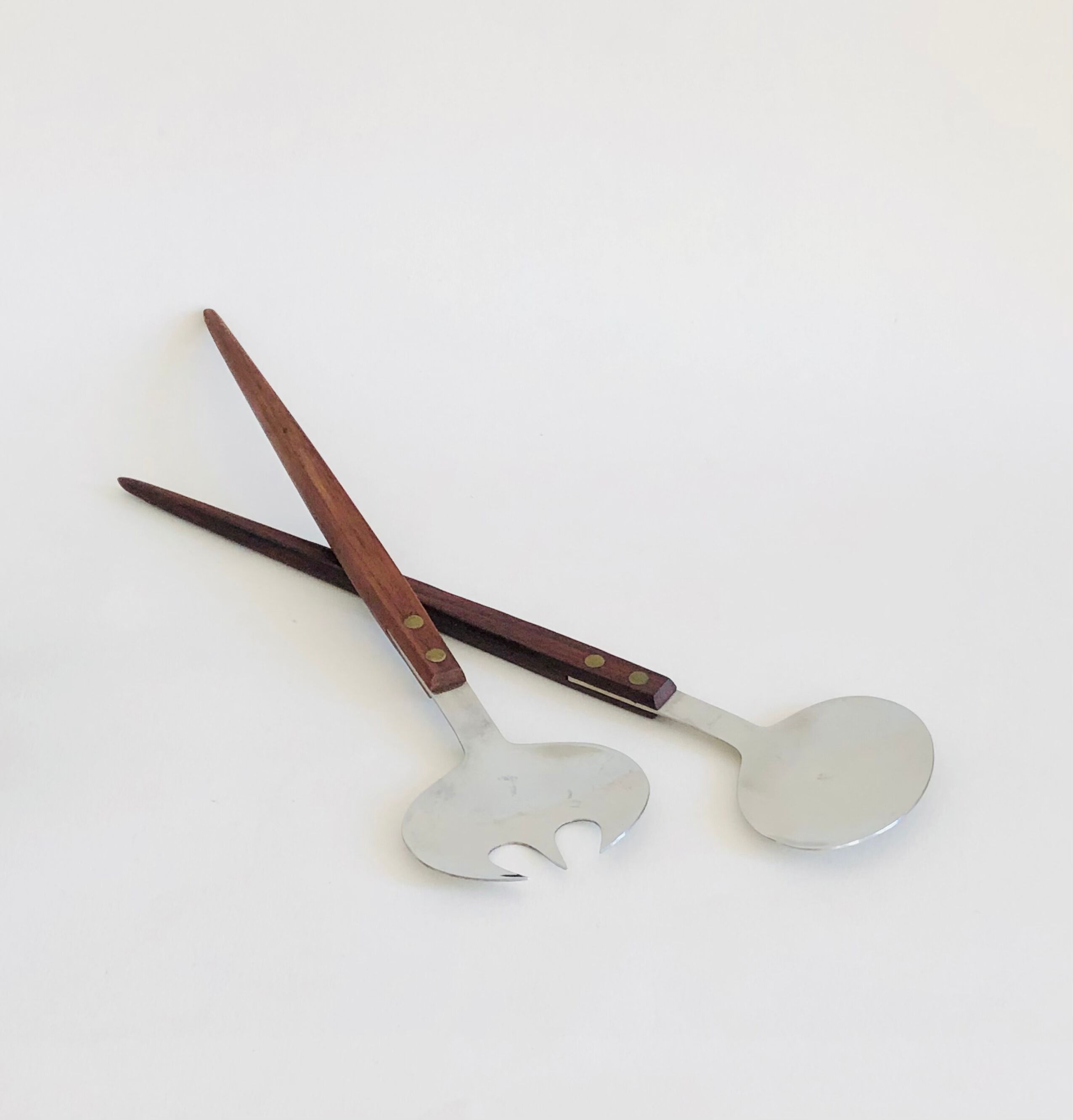 Set of Scandinavian salad cutlery, salt and pepper shaker in teak and steel