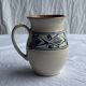 Vintage white pitcher with stylized blue plant frieze H17.5