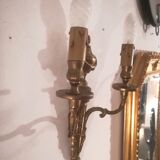 Pair of Louis XVI style sconces in gilded bronze