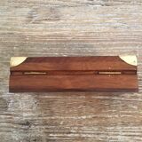 Small cabinet in walnut and brass