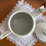 Antique porcelain coffee pot with stamped fire