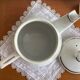 Antique porcelain coffee pot with stamped fire