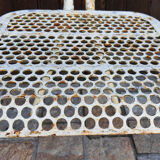 Perforated metal chairs René Malaval 1950