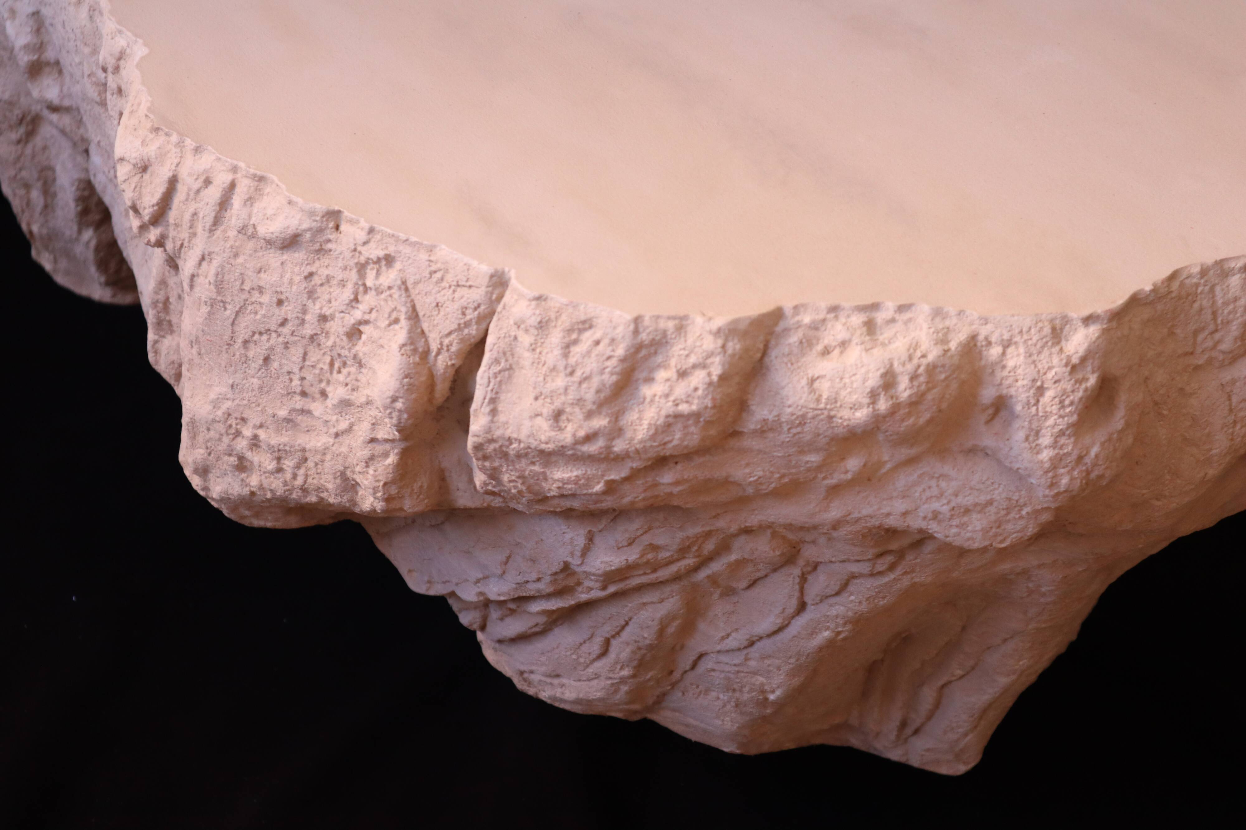Design coffee table with travertine rock effect — unique piece hand-sculpted.