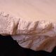 Design coffee table with travertine rock effect — unique piece hand-sculpted.