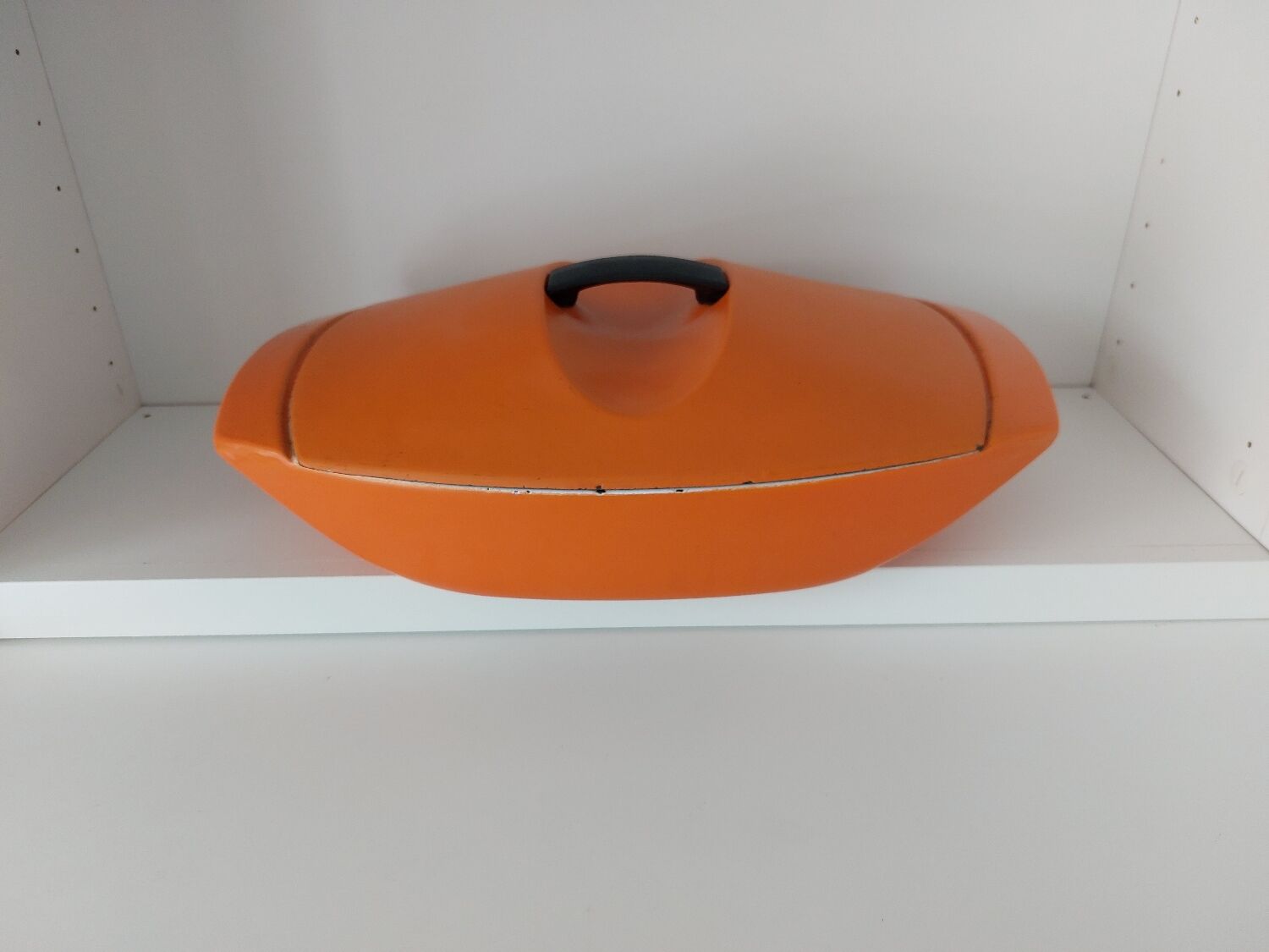 Double casserole in orange cast iron Le Creuset design Raymond Loewy