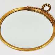 Round wall mirror in gilded wood, mid-century, C. Allodi & G. Subelli, Italy, 1950s.