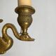Pair of double brass wall sconces in the Louis XVI style, decorated with swans