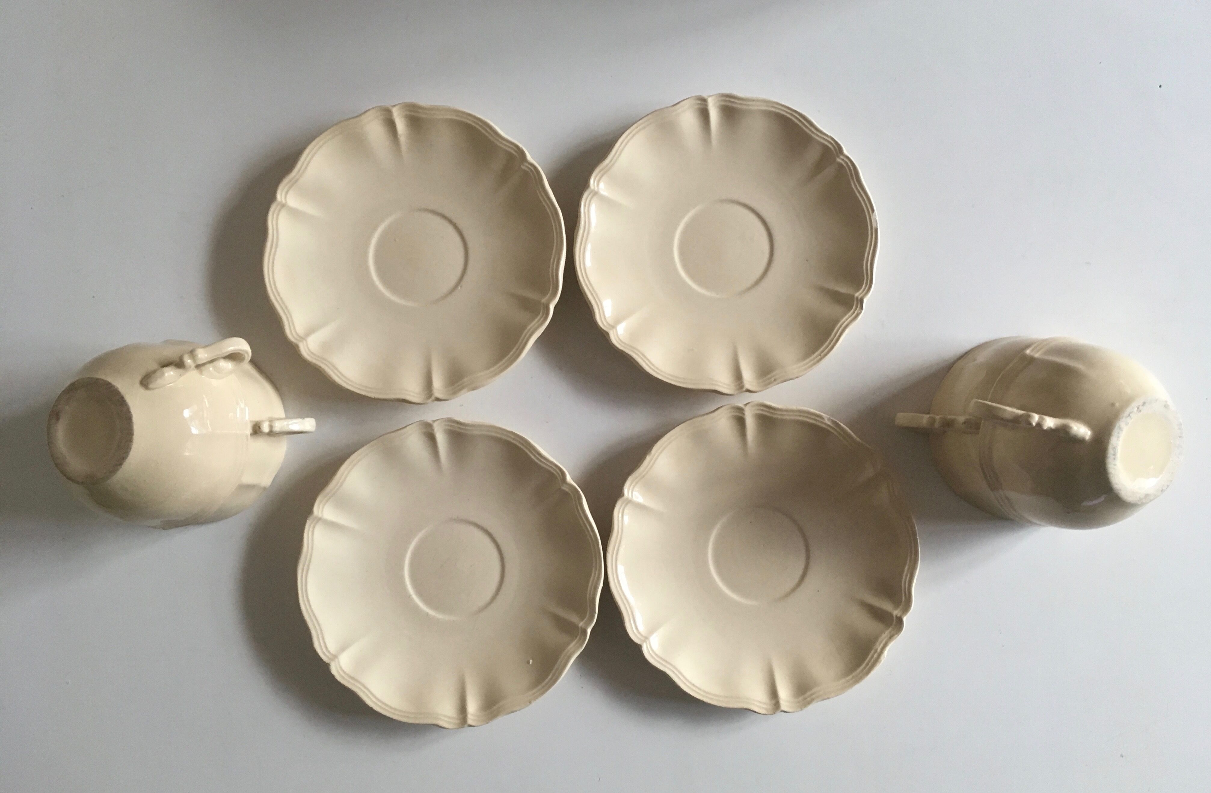 4 cups set in ivory faience from Sarreguemines to godrons