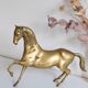 Vintage golden brass horse