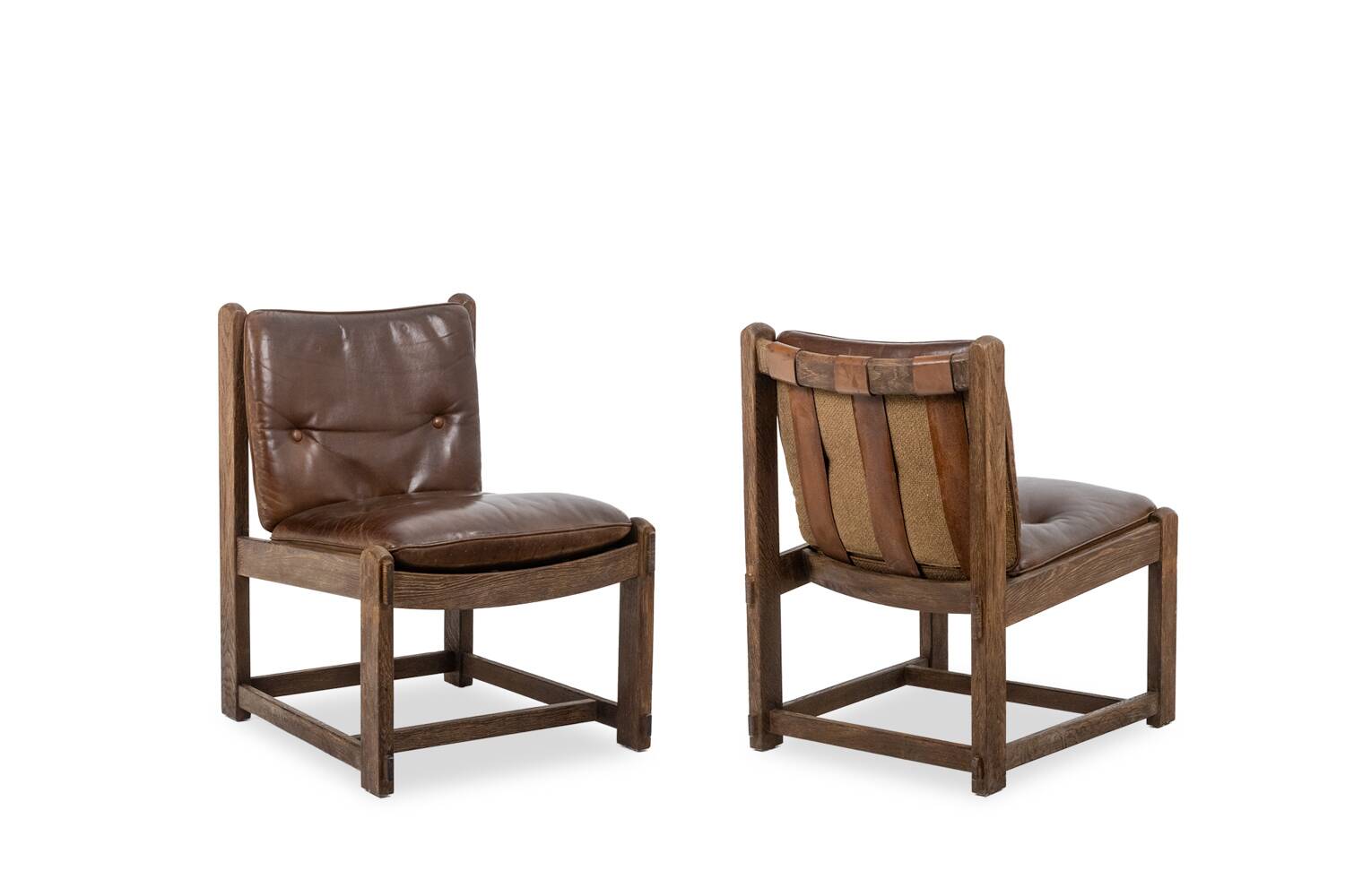 Pair of oak armchairs, upholstered in leather. Work from the 1960s.