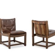 Pair of oak armchairs, upholstered in leather. Work from the 1960s.