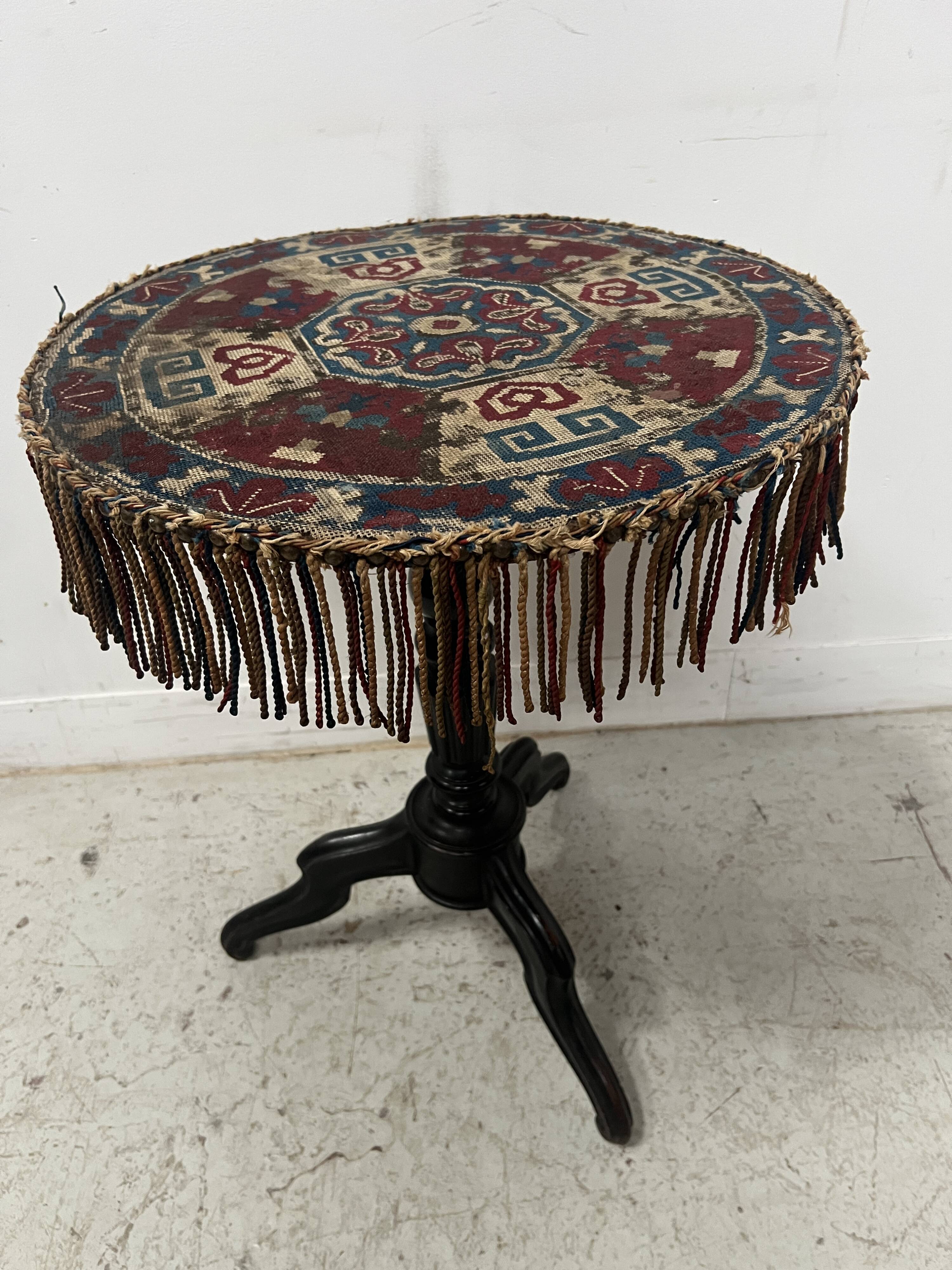 Napoleon III tilting side table in blackened wood, 19th century