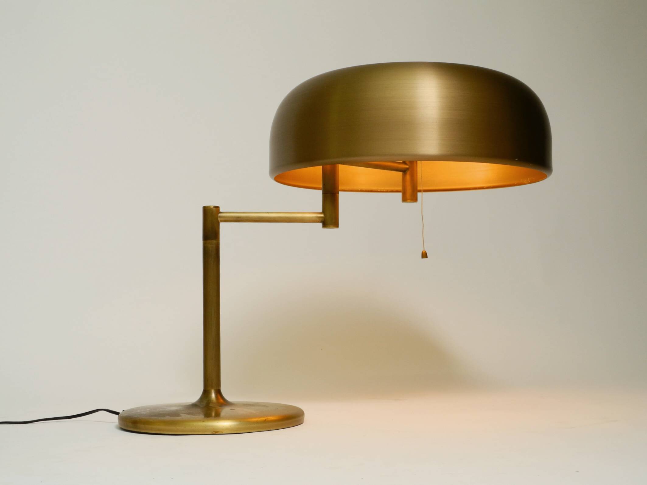 Extraordinary heavy 1960s XXL brass table lamp by Staff with a swivel joint