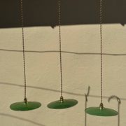 Vintage trio suspension lampshade in green and white enamelled metal.