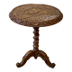 Carved wooden pedestal table