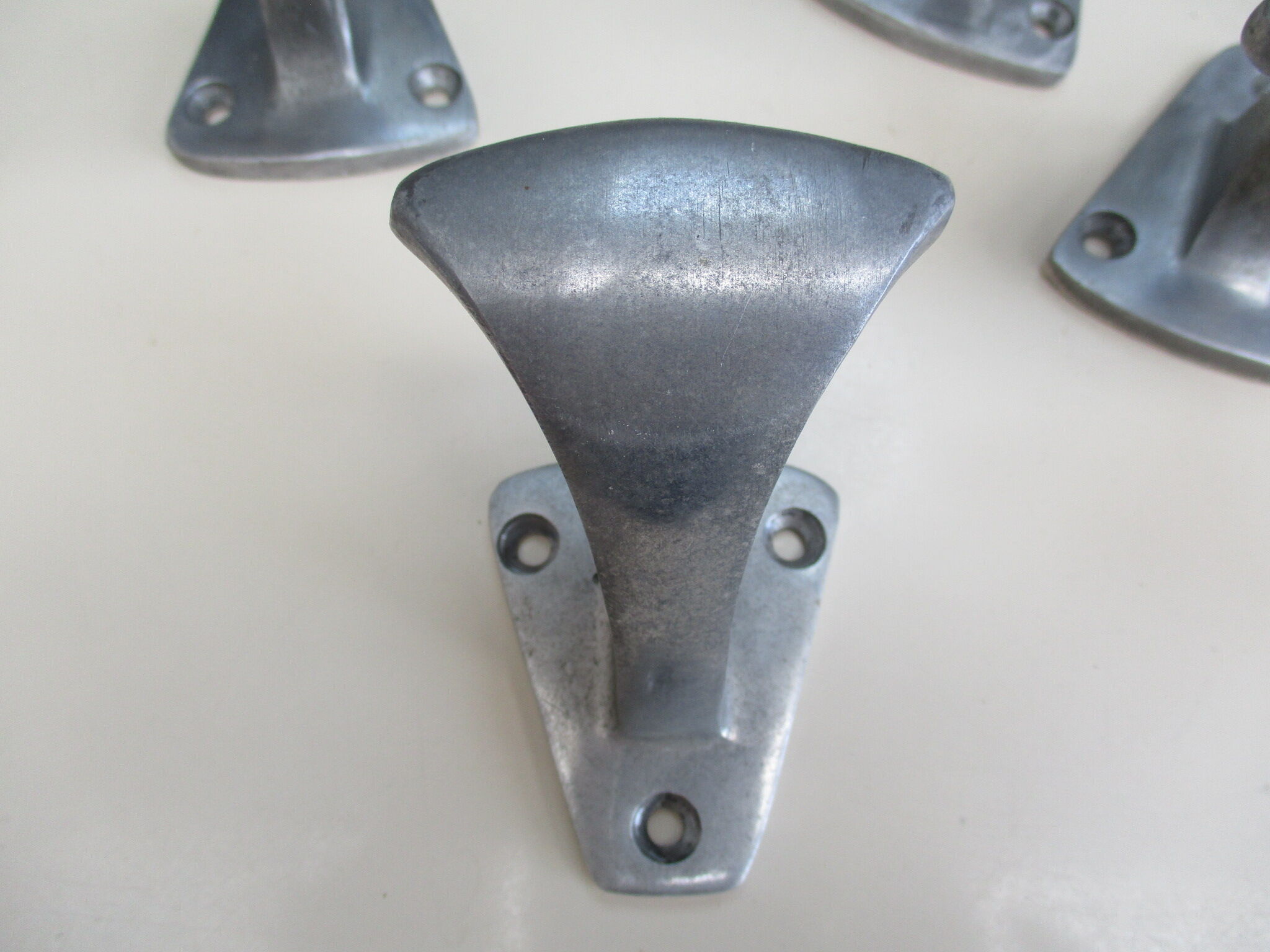 4 PATERES made of aluminum cast industrial design