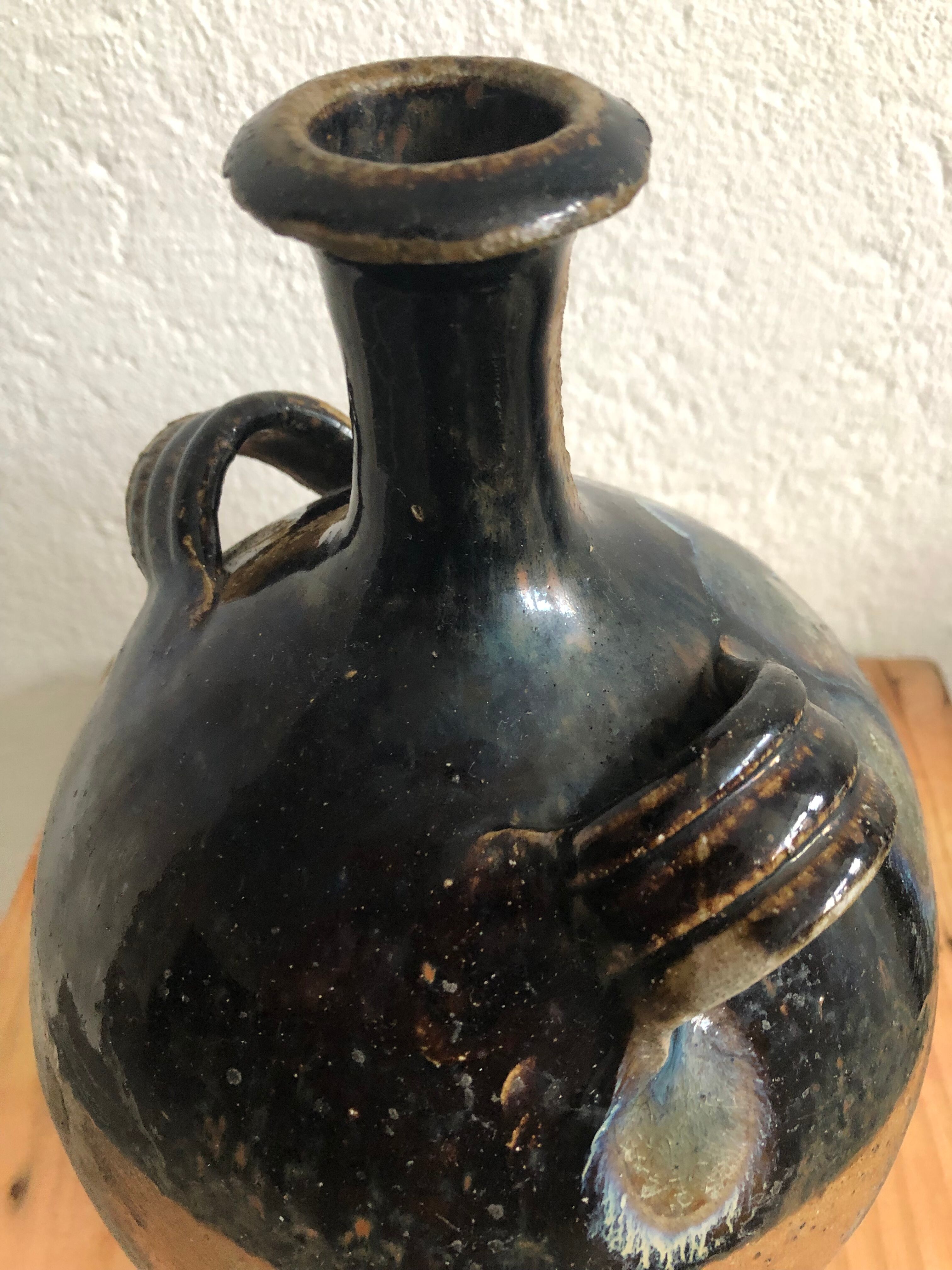 Old glazed terracotta jar