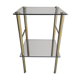 Brass sofa tip and smoked glass