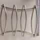 Silver metal modernist table mat