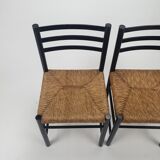 Set of 2 black and straw modernist side chairs, 1960s