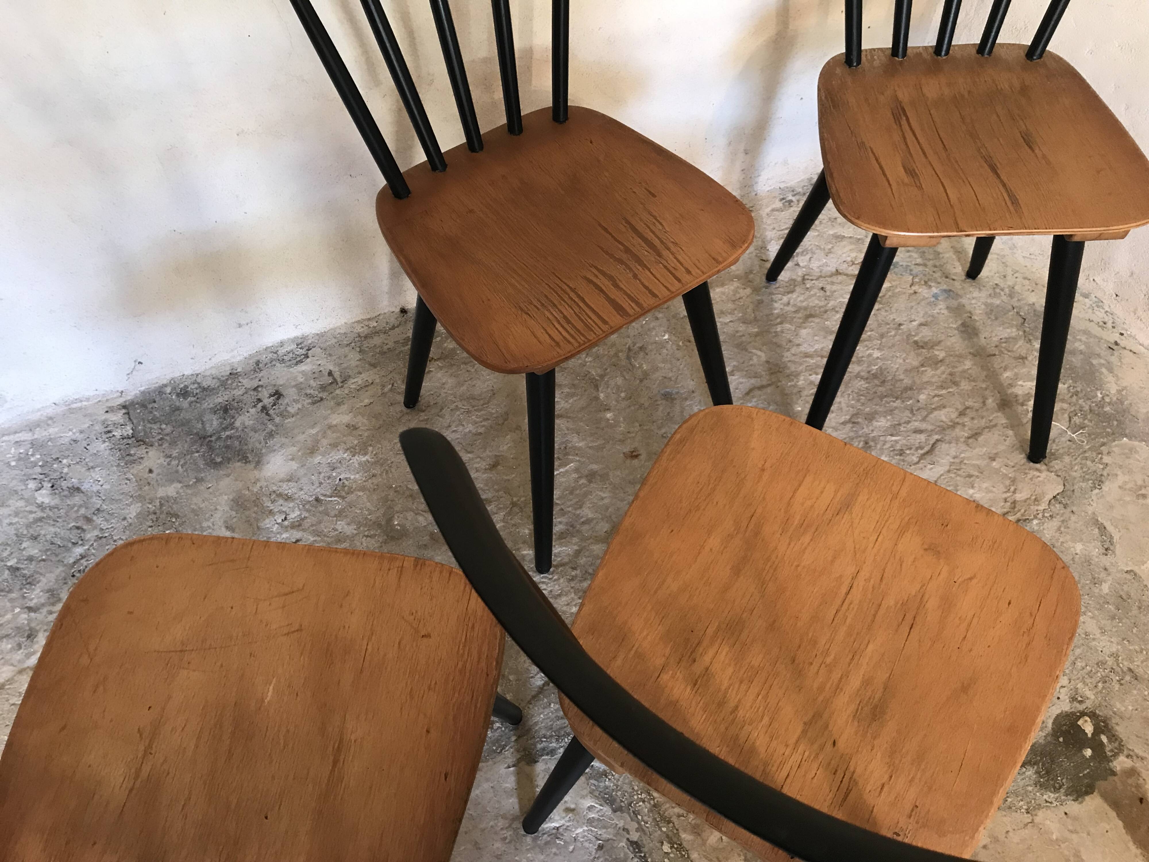 Set of 4 vintage 1960's chairs with bars and black compass legs