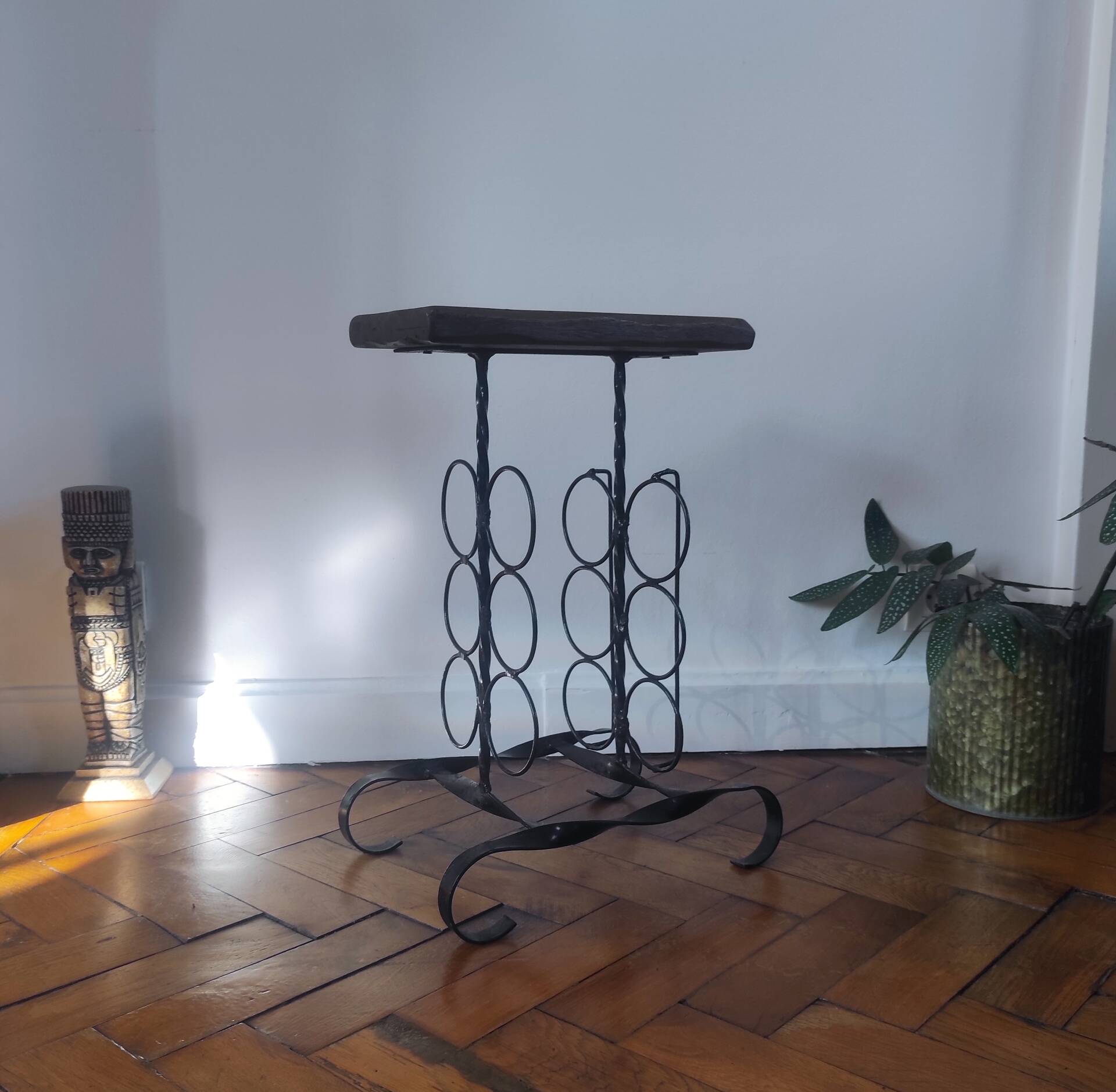 Side table, brutalist bottle holder in wrought iron and solid wood.