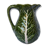 Pitcher dabbling cabbage leaf
