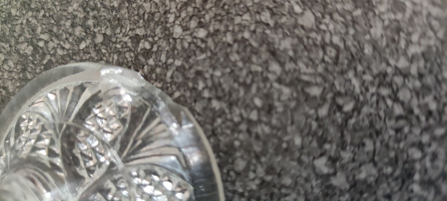 Vase on cut crystal stand