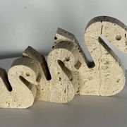 Swans Enzo Mari travertine for Fratelli Mannelli, Italy, 1970.