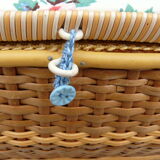Wicker and scoubidou sewing box