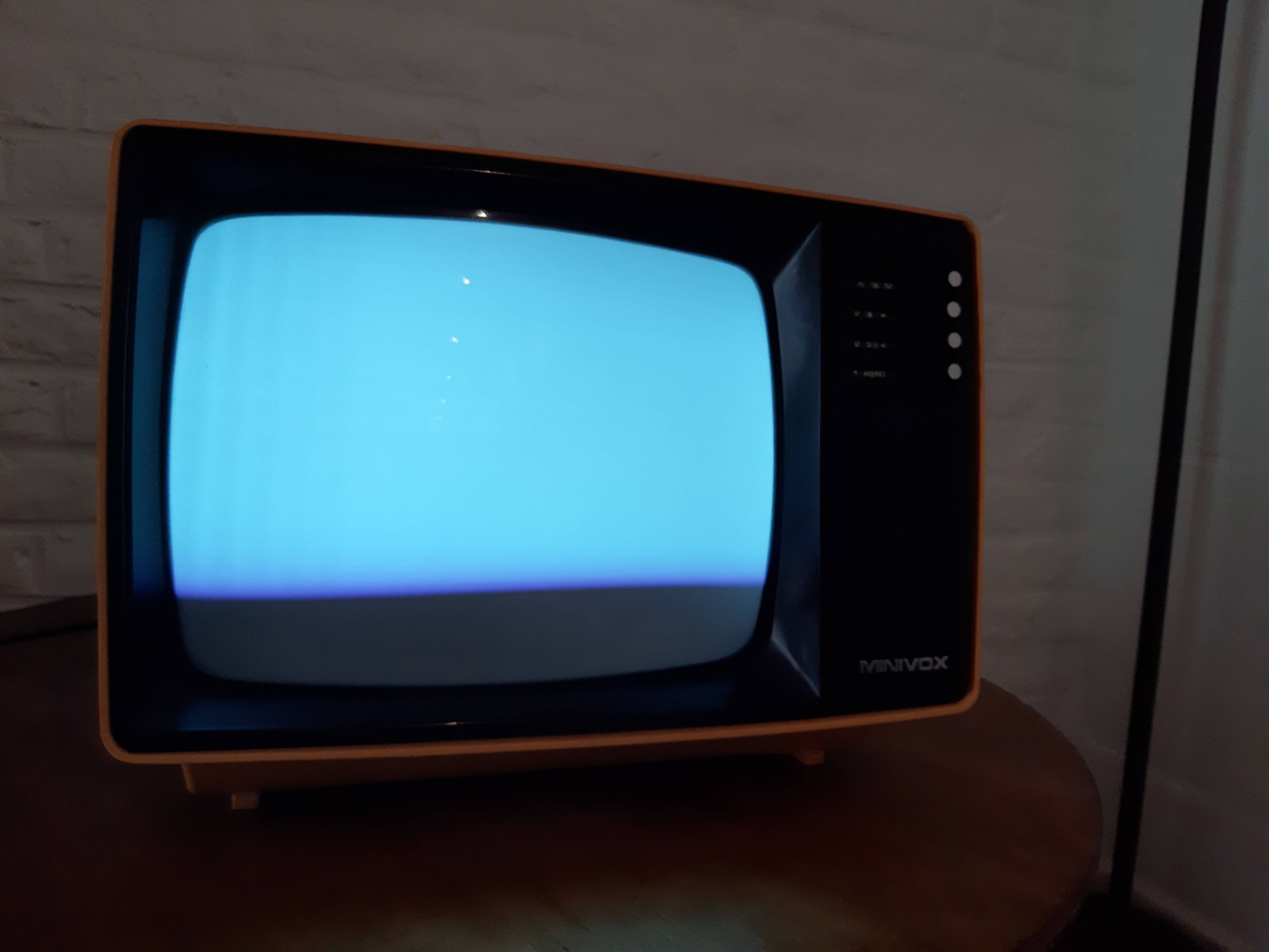 Yellow minivox vintage tv