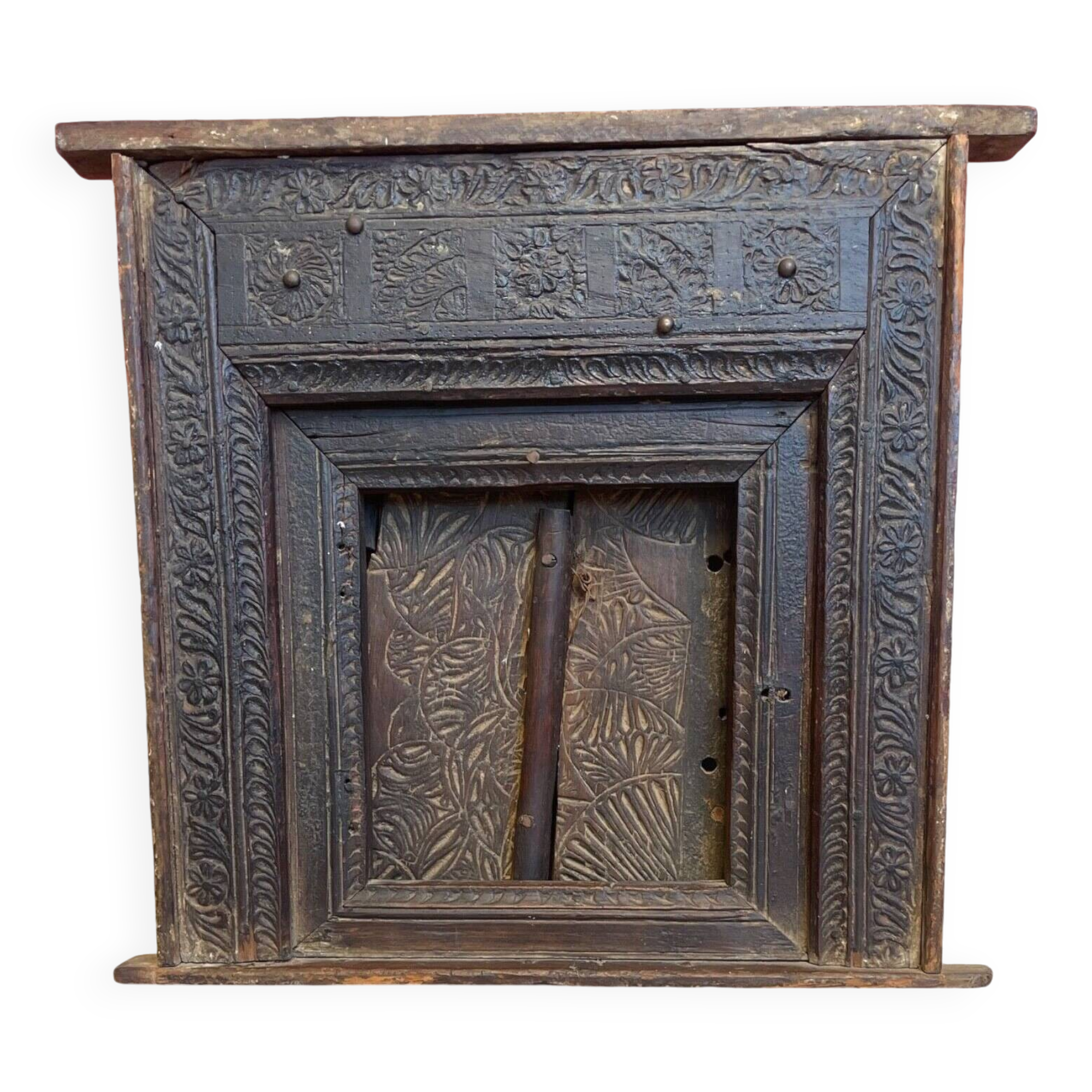 Old Indian window with carved decoration of flowers and foliage 19th century