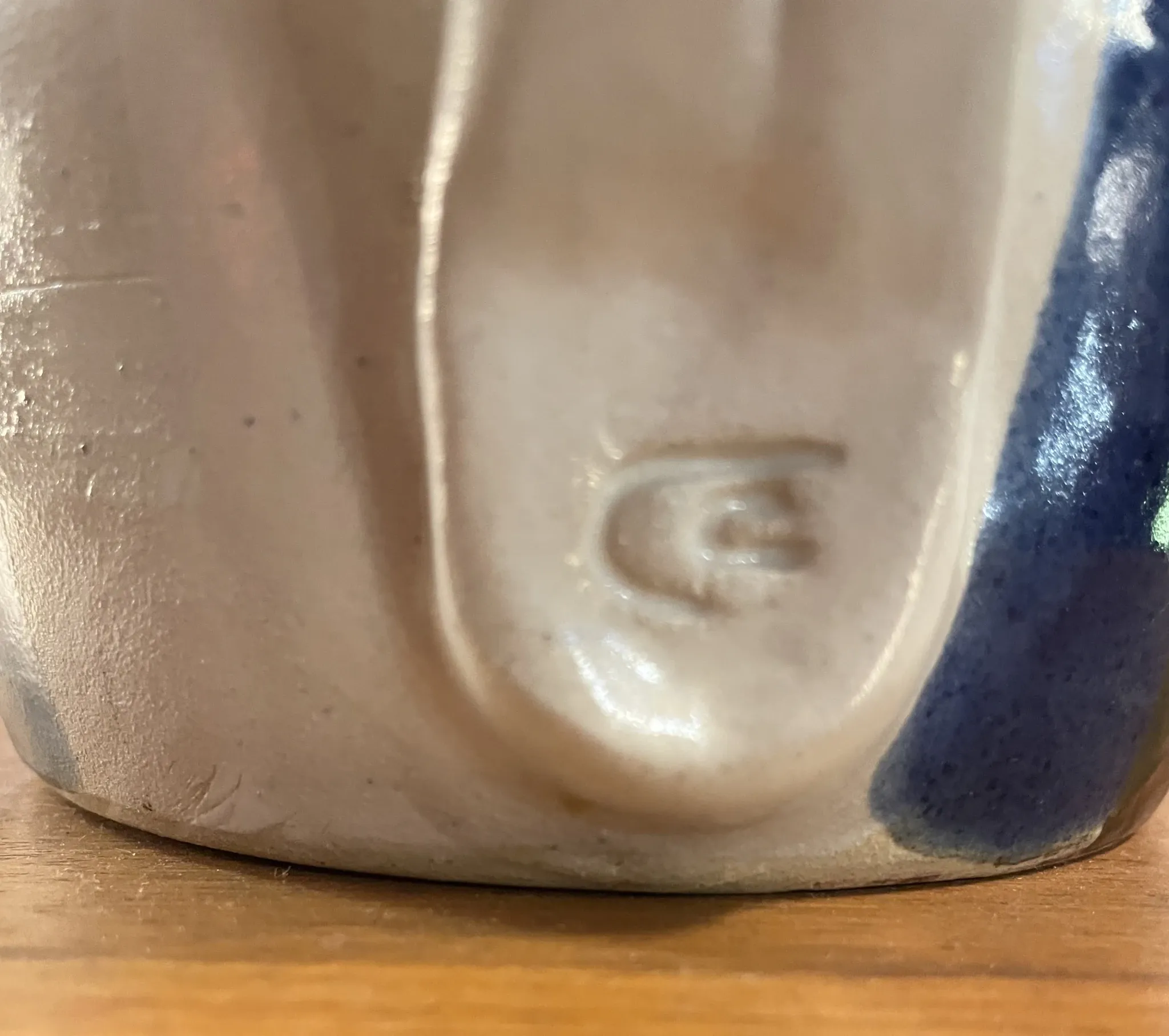 Beige and blue stoneware jug