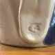Beige and blue stoneware jug