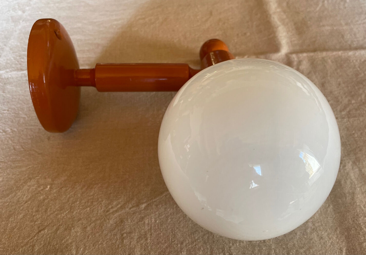 Vintage wooden globe wall light in white glass