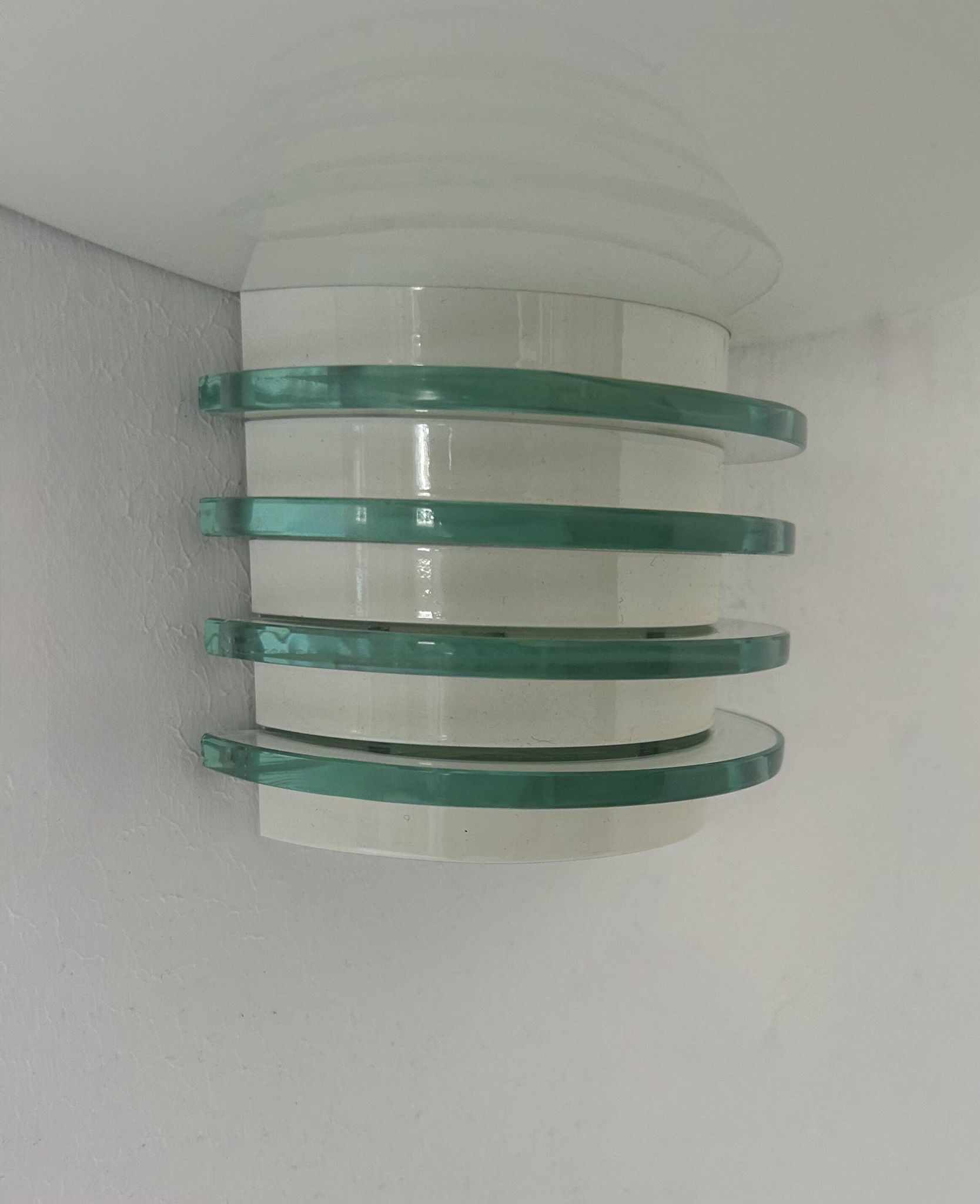 Pair of post-modernist wall lights, white metal and glass, France 1980