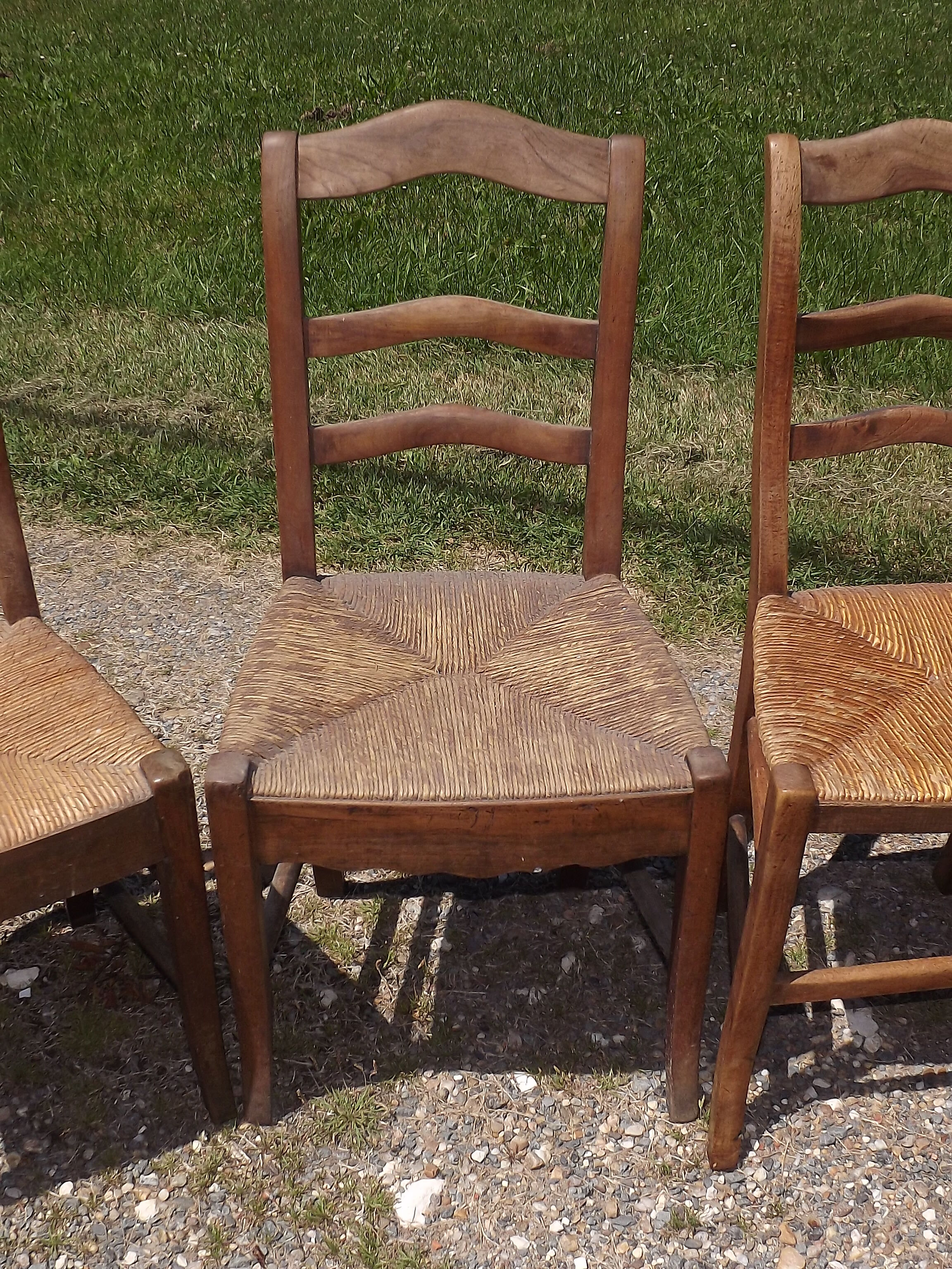 17 old straw chairs