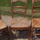 17 old straw chairs