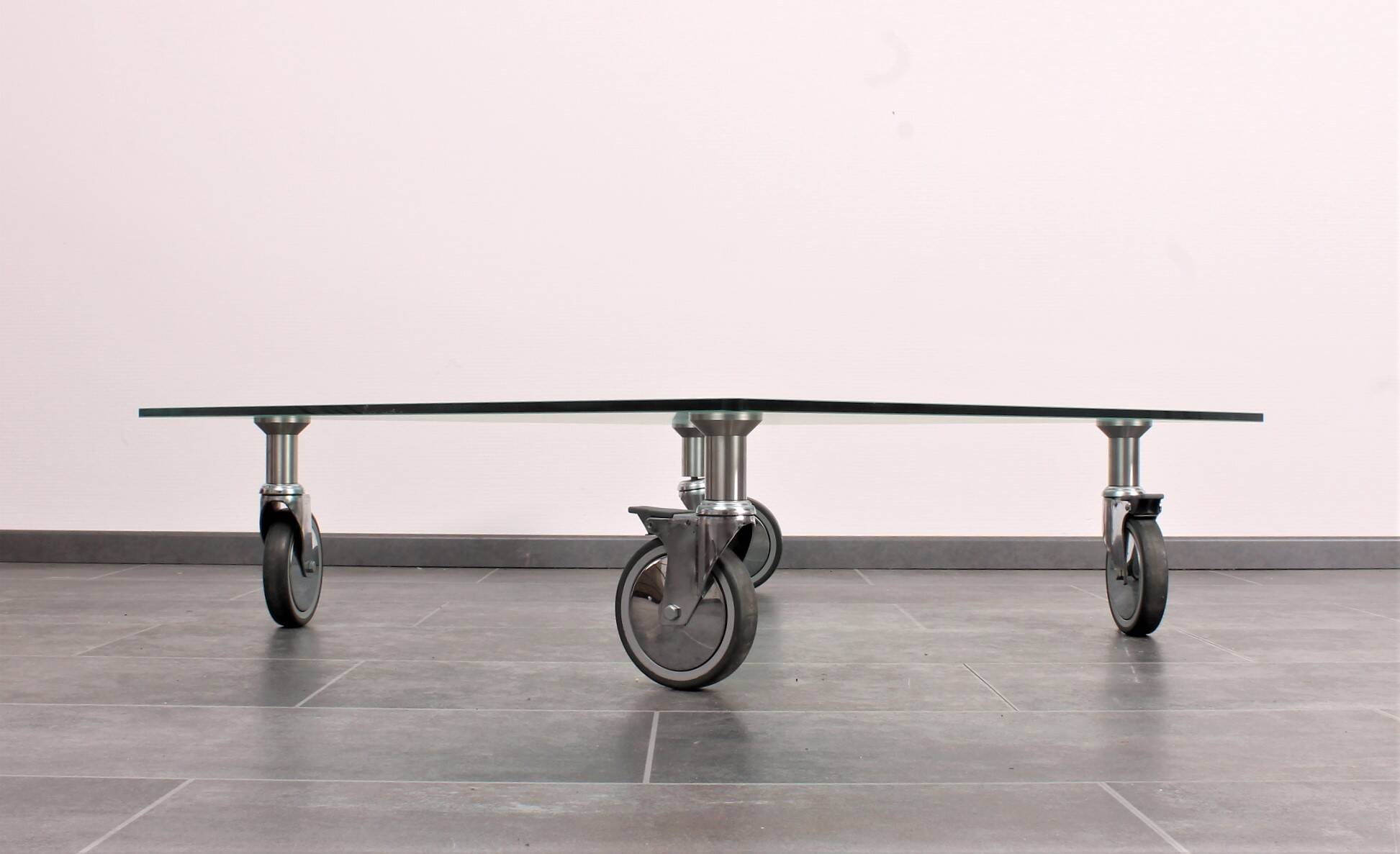 Wheeled glass coffee table