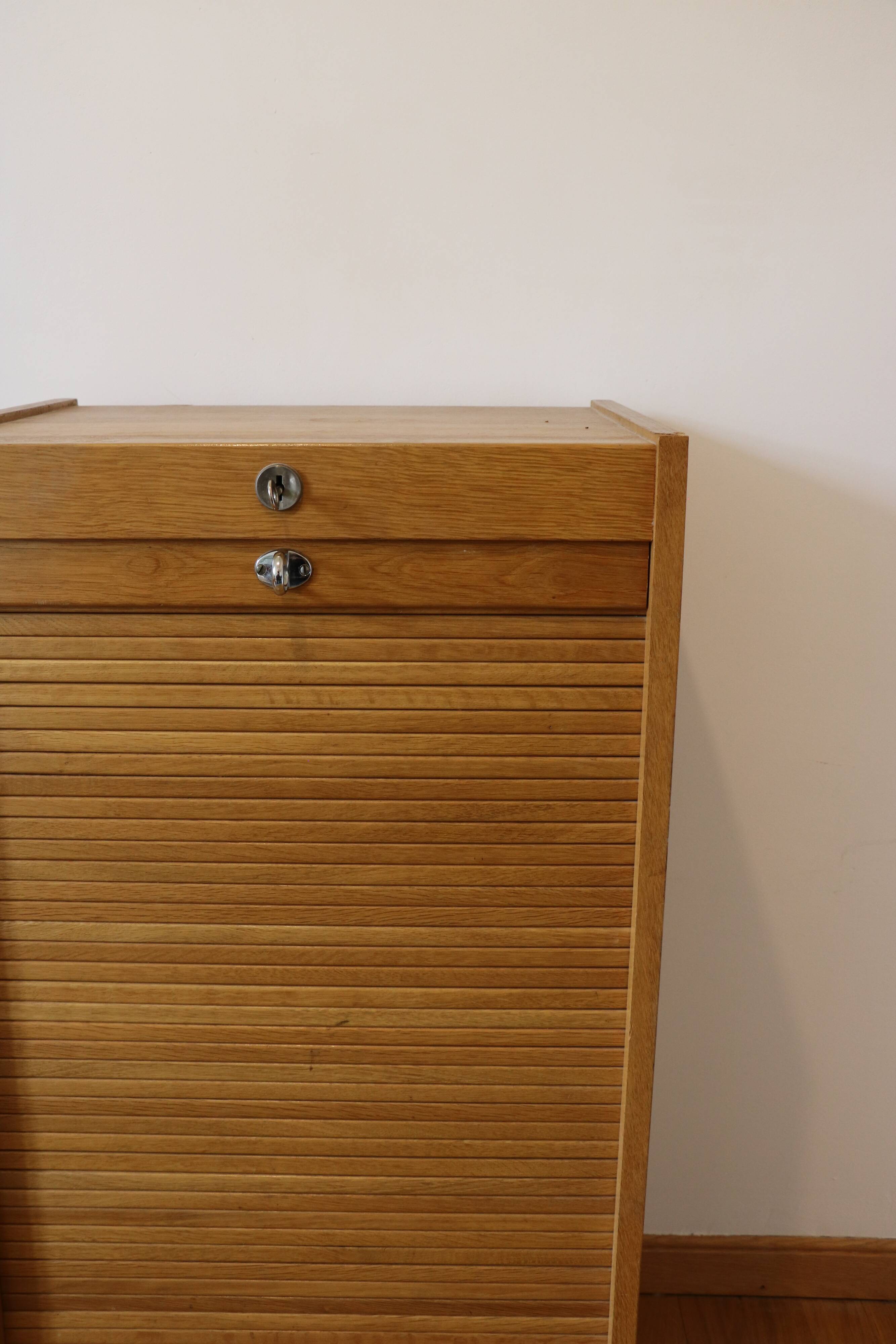 Filing cabinet with curtain